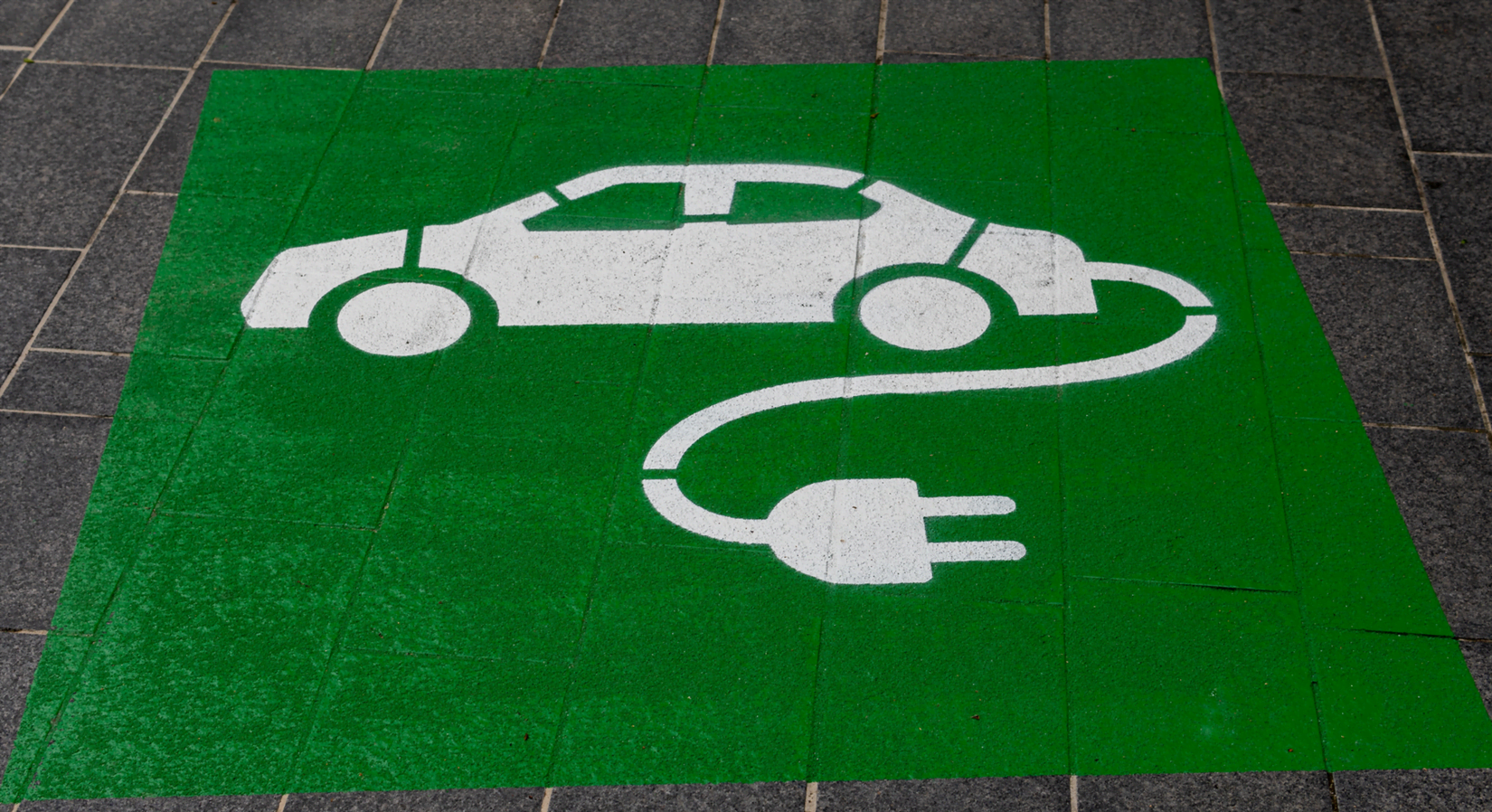 EV Charging Icon on Pavement