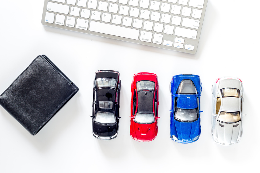 Chevy financing materials including toy cars and keyboard