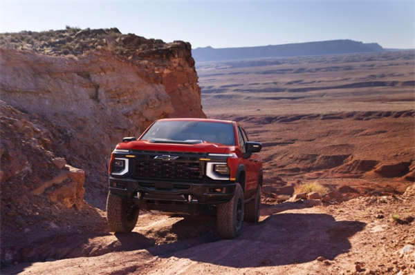 The 2027 Chevrolet Silverado 1500 climbing rough terrain