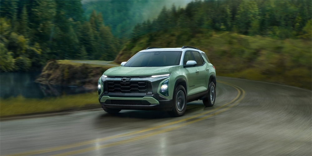 2026 Chevrolet Equinox driving on the road powered by a 1.5-liter turbocharged engine