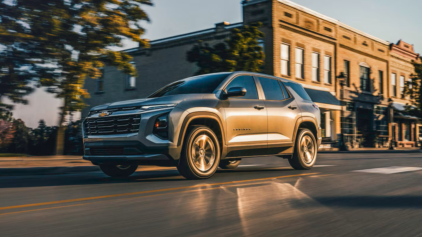 2026 Chevrolet Equinox LT Trim driving through town level